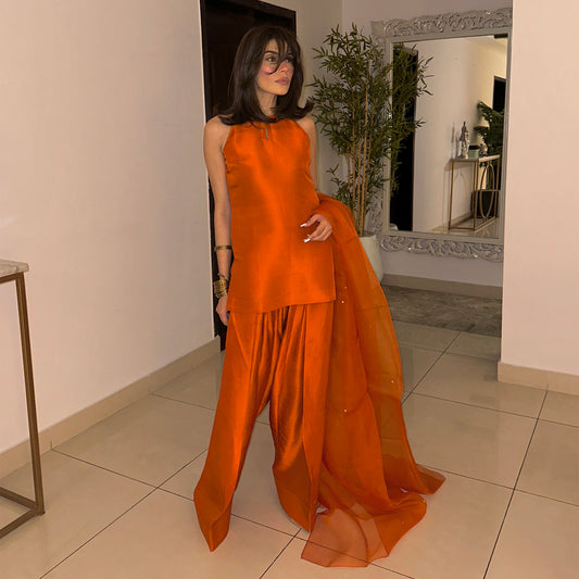 Amna Baber Orange Statement