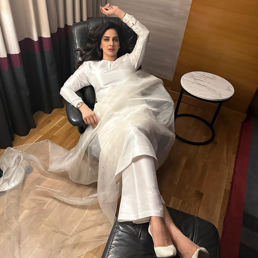 Saba Qamar In White, Stripped Down To Shape And Shine