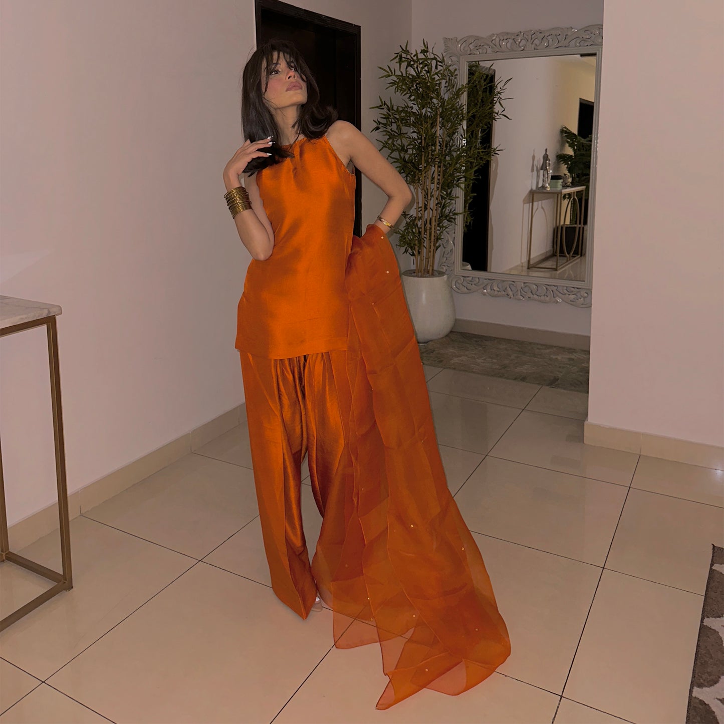 Amna Baber Orange Statement