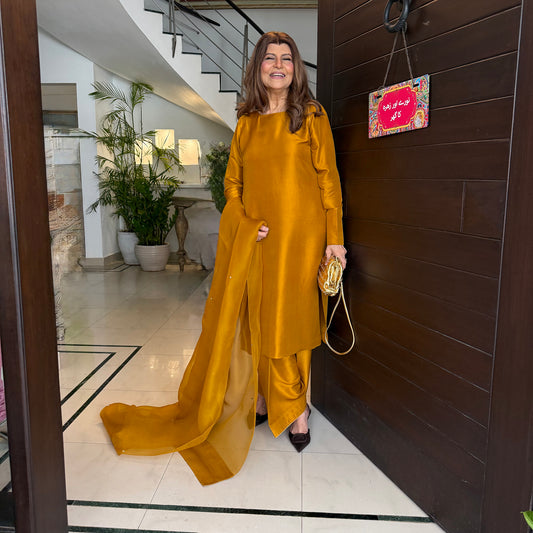Rubina Ashraf In Mustard-Sharp Cut, Classic Roots