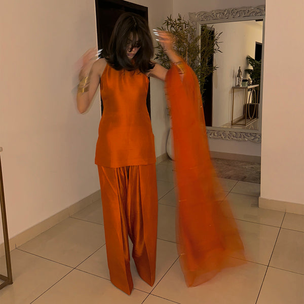 Amna Baber Orange Statement
