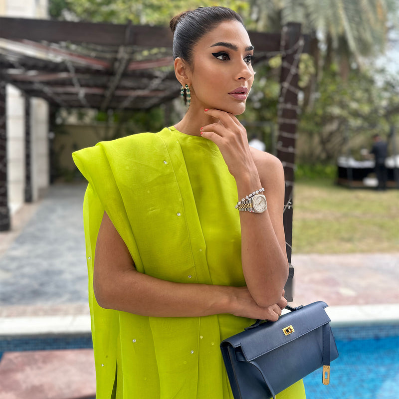 Kiran Malik Brings Quiet Power To Neon