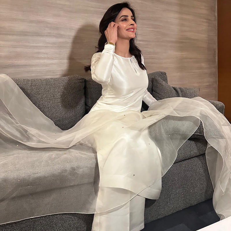 Saba Qamar In White, Stripped Down To Shape And Shine