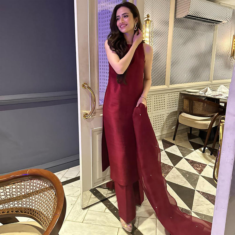 Sana Javed in Deep Maroon Simply Iconic.