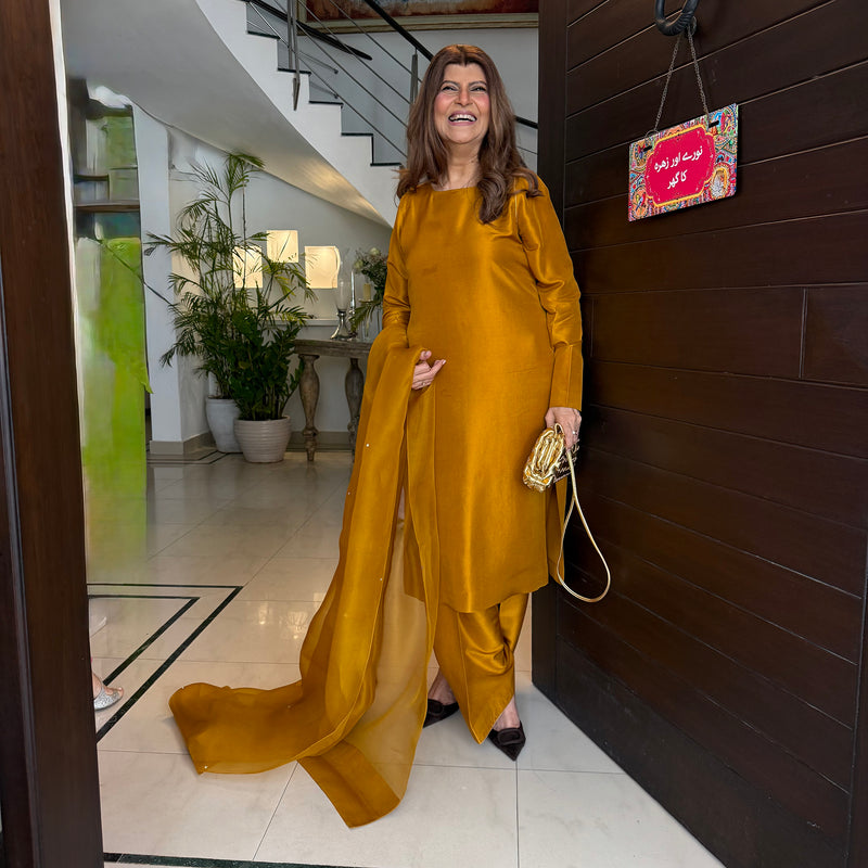Rubina Ashraf In Mustard-Sharp Cut, Classic Roots